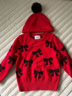 Madison Red Sweater with Black Bow Motif and Pom Pom Beanie